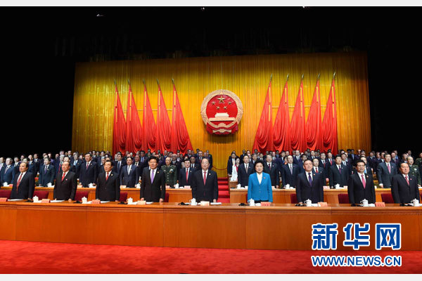 10月1日，慶祝中華人民共和國成立66周年暨新疆維吾爾自治區(qū)成立60周年大會在新疆人民會堂隆重舉行。 新華社記者 饒愛民 攝
