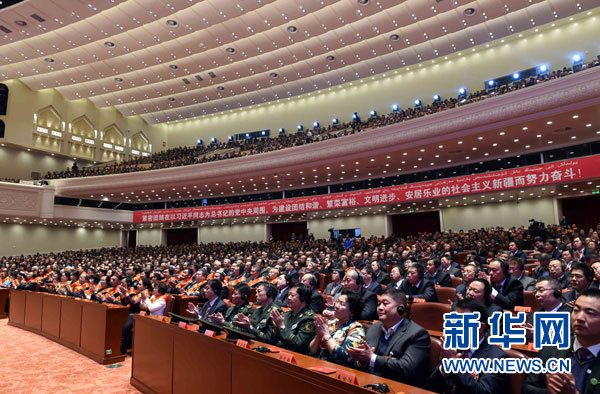 10月1日，慶祝中華人民共和國成立66周年暨新疆維吾爾自治區(qū)成立60周年大會在新疆人民會堂隆重舉行。這是大會會場。 新華社記者 饒愛民攝 