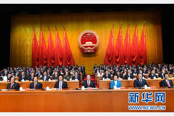 10月1日，慶祝中華人民共和國成立66周年暨新疆維吾爾自治區(qū)成立60周年大會在新疆人民會堂隆重舉行。 新華社記者 饒愛民 攝