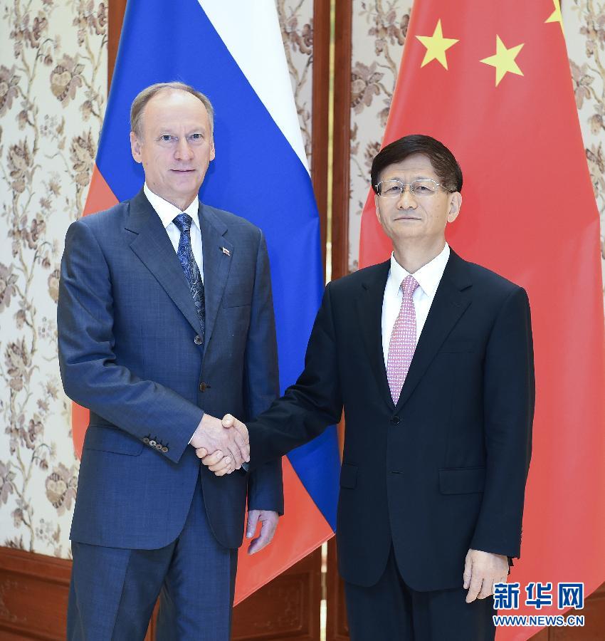 9月13日，中共中央政治局委員、中央政法委書記孟建柱在北京同俄羅斯聯(lián)邦安全會議秘書帕特魯舍夫共同主持中俄執(zhí)法安全合作機制第三次會議。新華社記者張領攝