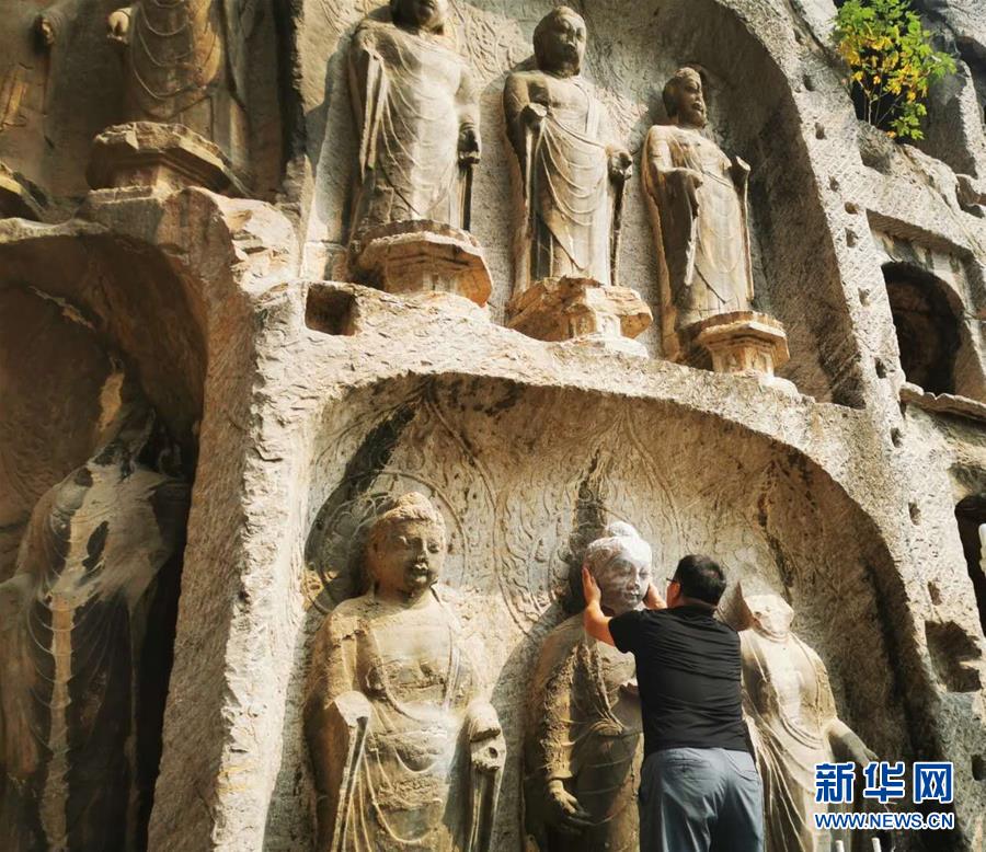 （圖文互動）（4）合體了，龍門石窟流散佛首首次實現(xiàn)“數(shù)字復(fù)位”