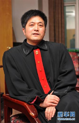 （圖文互動(dòng)）其人如蘭，既潔且馨——追記“全國(guó)模范法官”胡國(guó)運(yùn)