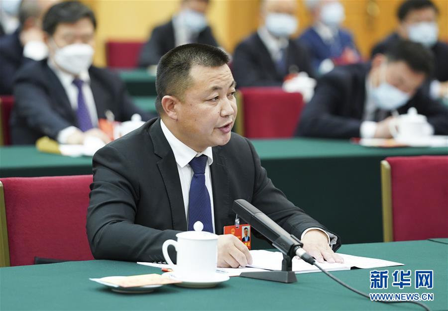 （新華全媒頭條·圖文互動）（11）從人民中汲取磅礴力量——習(xí)近平總書記同出席2020年全國兩會人大代表、政協(xié)委員共商國是紀實