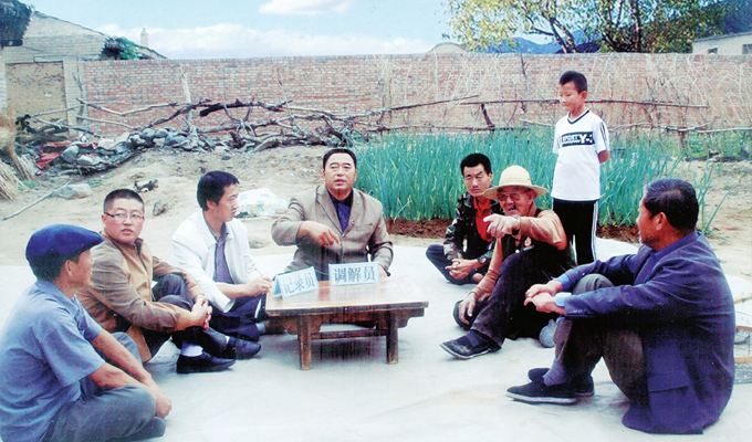 調(diào)解“家長里短，雞毛蒜皮”的小事情是李培斌從事的大事業(yè)