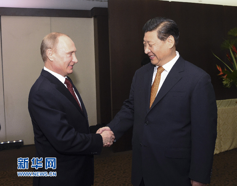 7月14日，國家主席習(xí)近平在巴西福塔萊薩會見俄羅斯總統(tǒng)普京。新華社記者李學(xué)仁攝