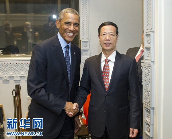 9月23日，國家主席習(xí)近平特使、國務(wù)院副總理張高麗在紐約會見出席聯(lián)合國氣候峰會的美國總統(tǒng)奧巴馬。 新華社記者王曄攝