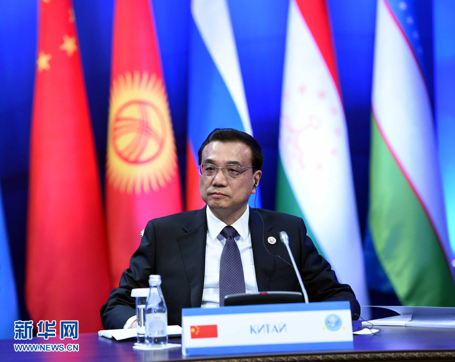 12月15日，中國國務院總理李克強在阿斯塔納出席上海合作組織成員國政府首腦理事會第十三次會議。 新華社記者 饒愛民 攝