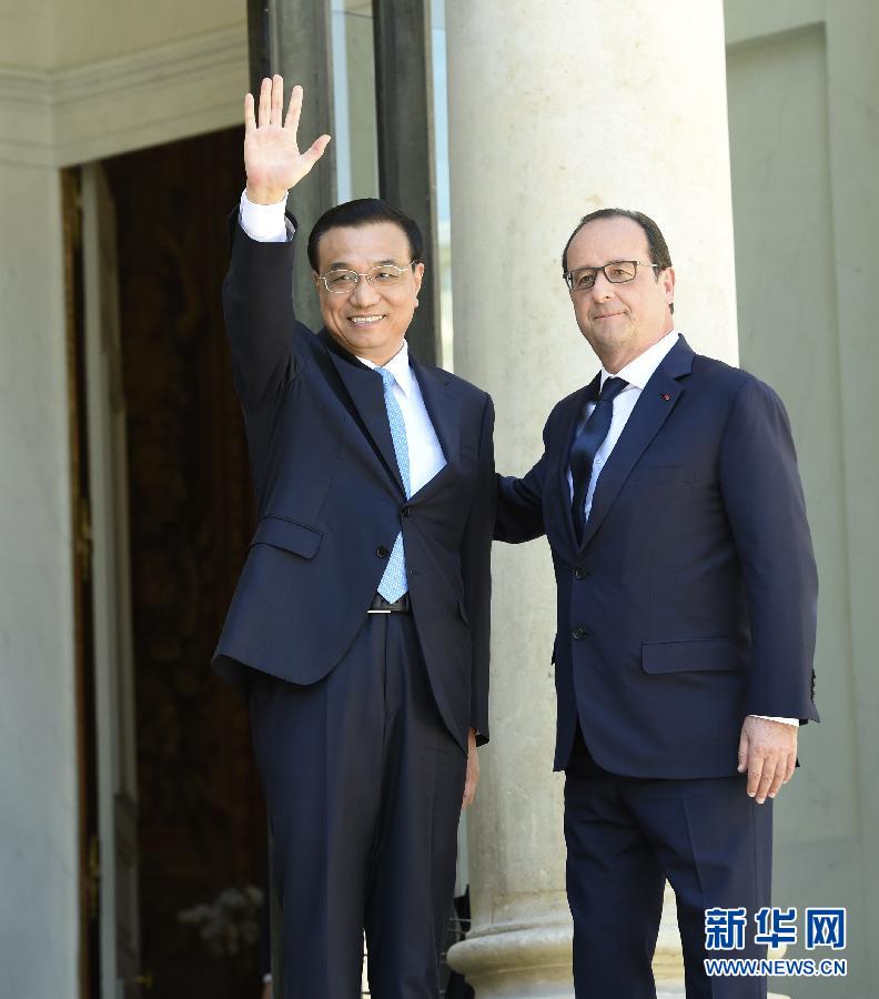 當地時間6月30日下午，中國國務院總理李克強在巴黎愛麗舍宮會見法國總統(tǒng)奧朗德。 新華社記者李學仁攝 