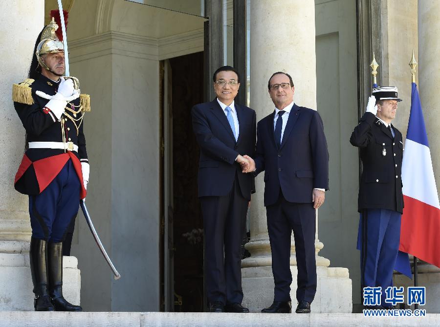 當地時間6月30日下午，國務院總理李克強在巴黎愛麗舍宮會見法國總統(tǒng)奧朗德。 新華社記者李學仁攝