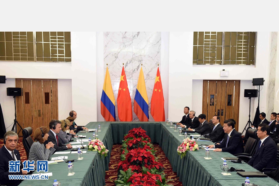 11月18日，國家主席習(xí)近平在菲律賓馬尼拉會見哥倫比亞總統(tǒng)桑托斯。 新華社記者 饒愛民 攝